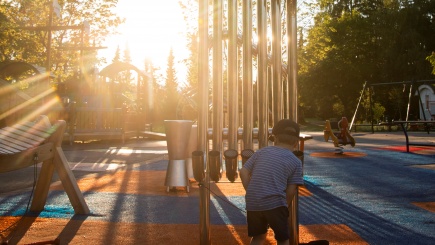 A boy playing in a music playground